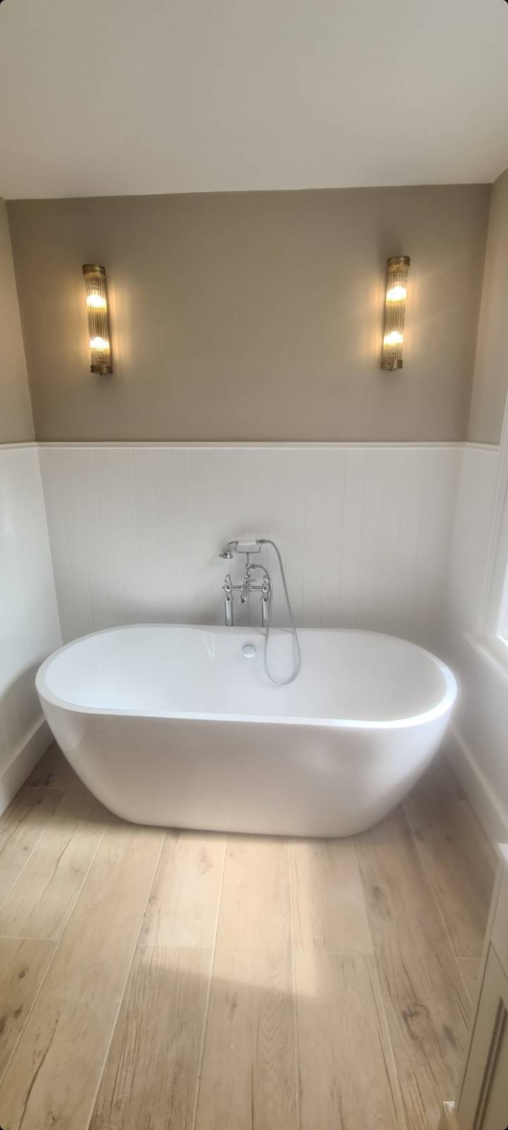 Bathroom refurbishment in Lewisham, South London_Installation of a new shower, toilet, vanity unit and bath_Holton Building Services