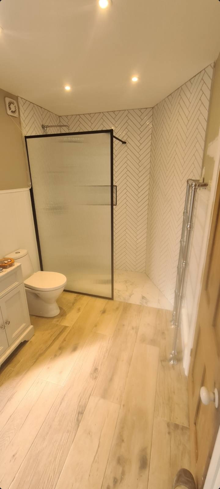 Bathroom refurbishment in Lewisham, South London_Installation of a new shower, toilet, vanity unit and bath_Holton Building Services